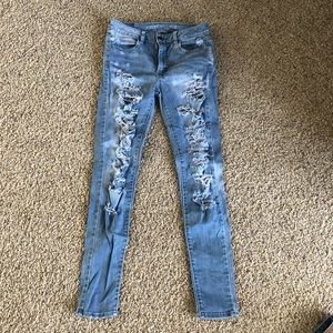 rarely worn ripped light wash jeans